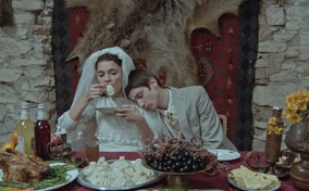 Still frame from the movie TRADITION